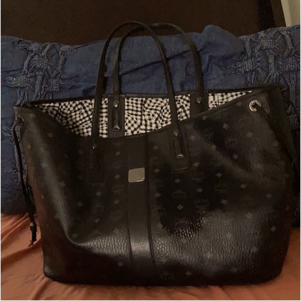 Black large MCM brand handbag